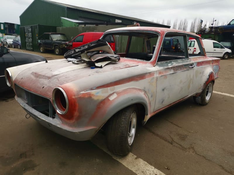Cortina after arches fitted and mid way through smoothing the body work.