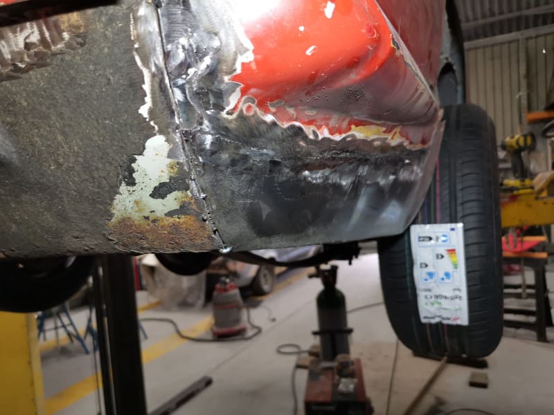 Welding work on rear quarter.